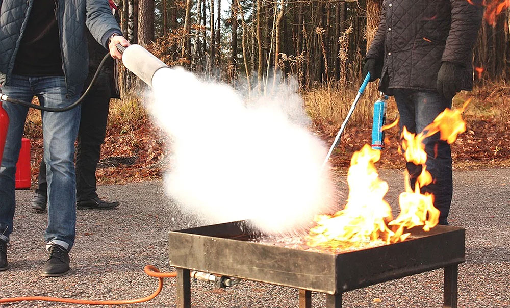 Anleitung zur richtigen Benutzung vom Feuerlöscher